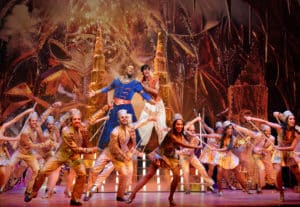 Cast of Aladdin on Broadway performing.