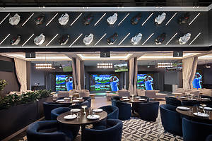 Golf simulators and tables at T-Squared Social
