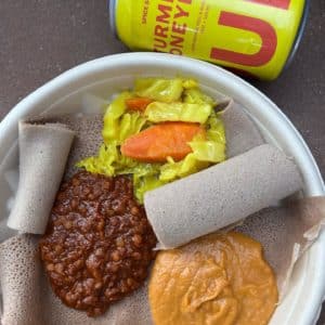 Various food on a plate at Makina Cafe Eritrean-Ethiopian Eatery