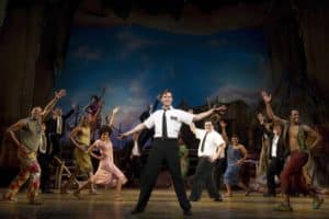 Cast of The Book of Mormon musical singing a song