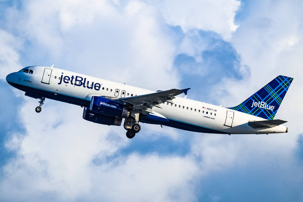 JetBlue plane in the sky