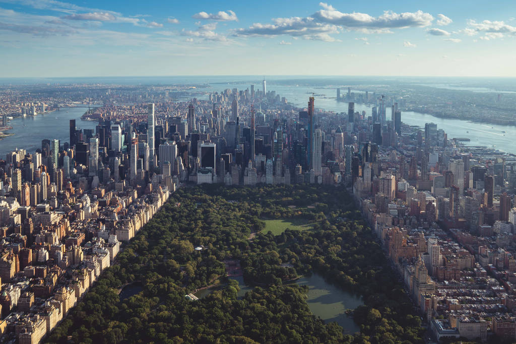 Bird's eye view of NYC and Central Park on a sunny day