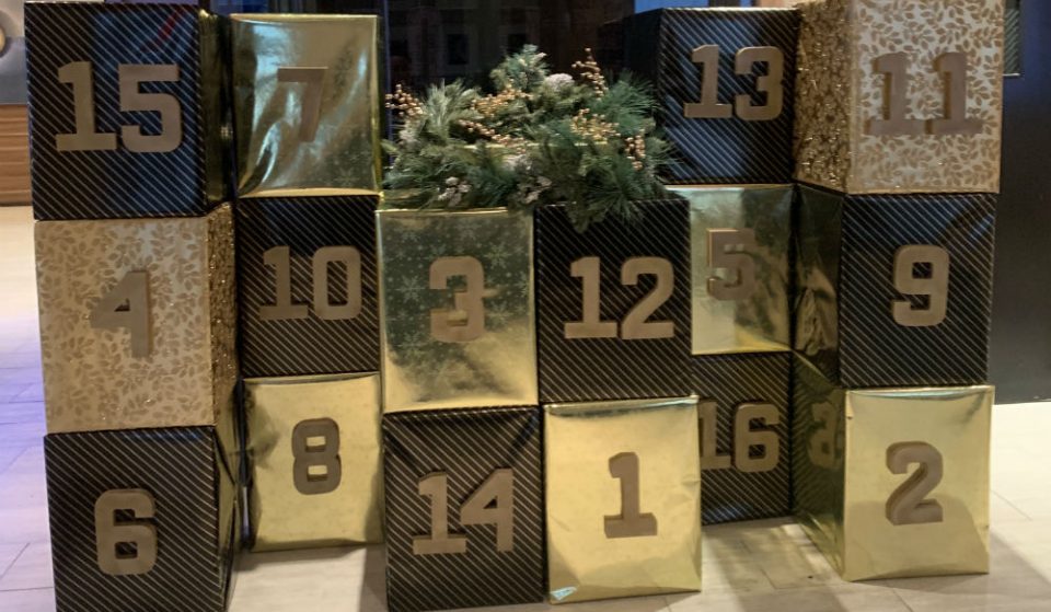 Score Free Gifts Every Day Of December At Midtown Life-Sized Advent Calendar