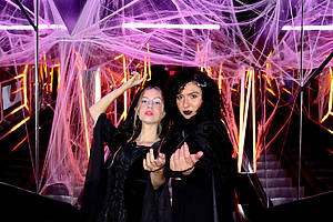 Two women in Halloween costumes at INTER_ in NYC