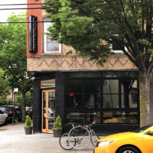 Exterior of Mighty Oak Roasters, a coffee shop in Astoria, Queens