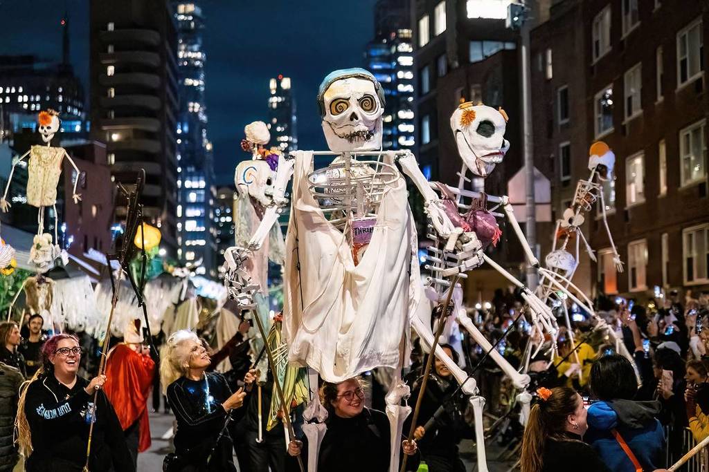 People at the Village Halloween Parade in New York City 2022.